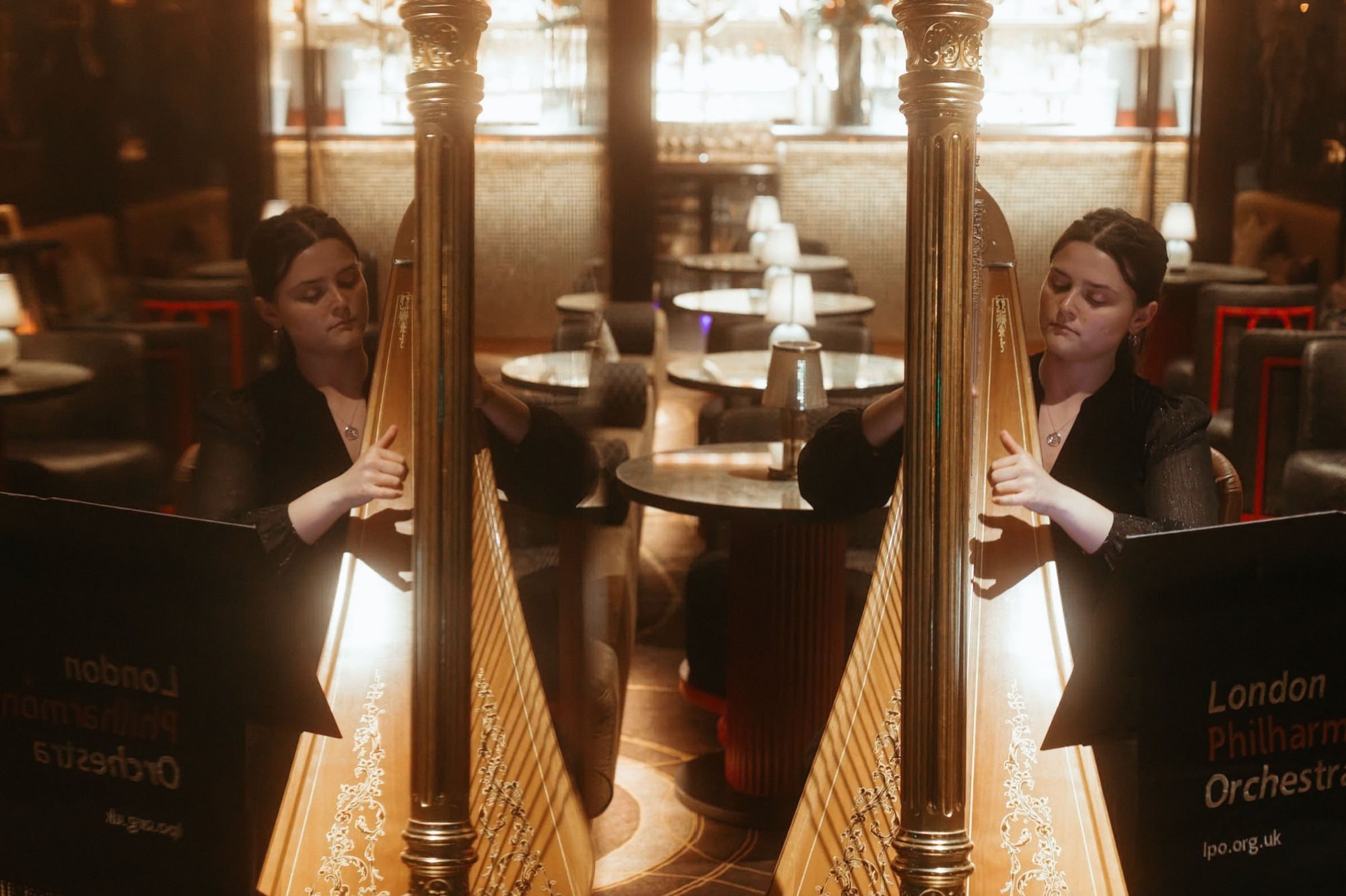 Harpists performing at a Circle dinner in London